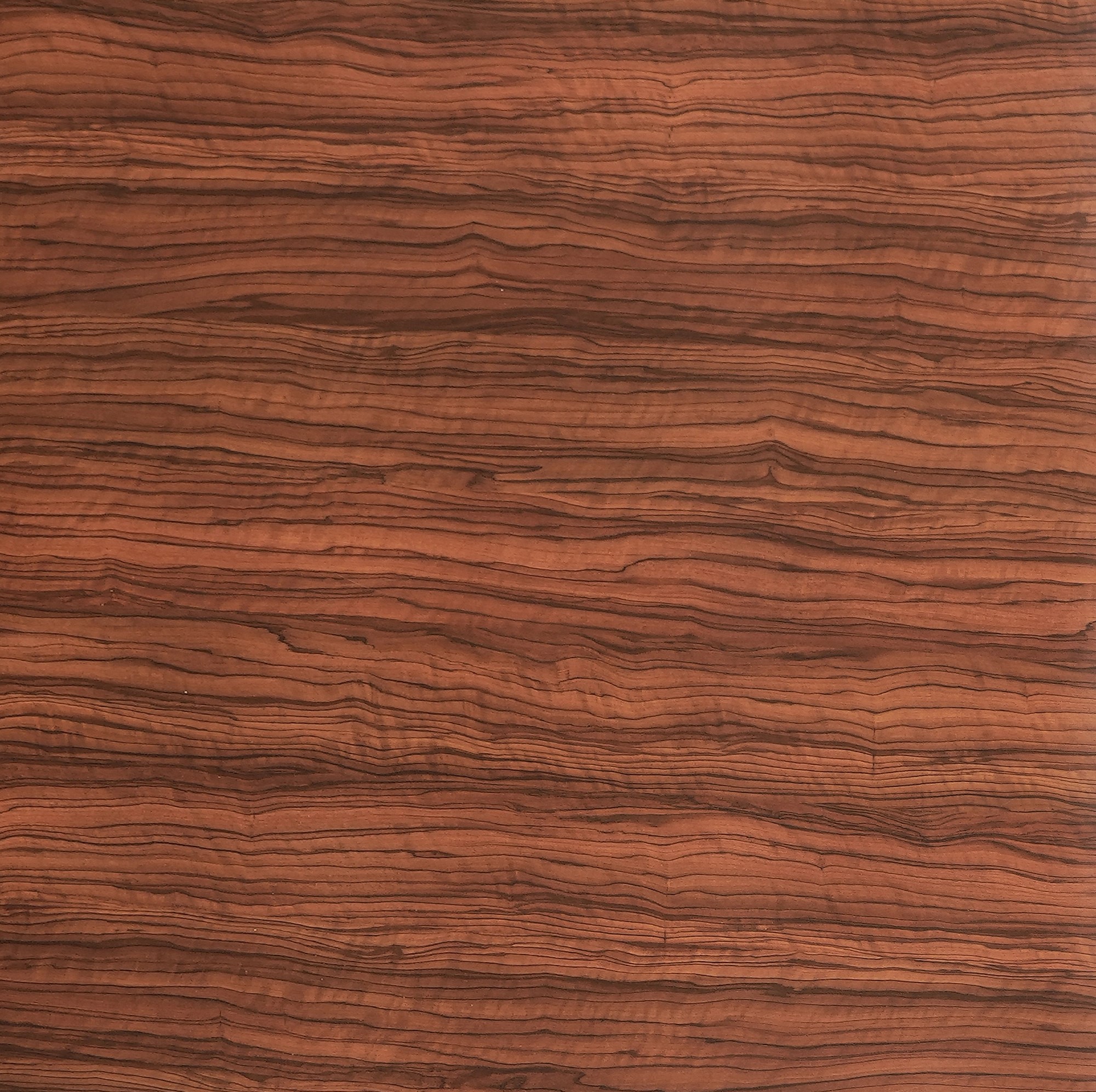 A close-up of a Brown WP 135 Sevilla Yoko Medium with a Suede finish Decorative Laminate available at Material Depot in Bangalore