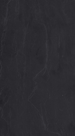 A close-up of a Black 8223 SM with a Matte finish Decorative Laminate available at Material Depot in Bangalore