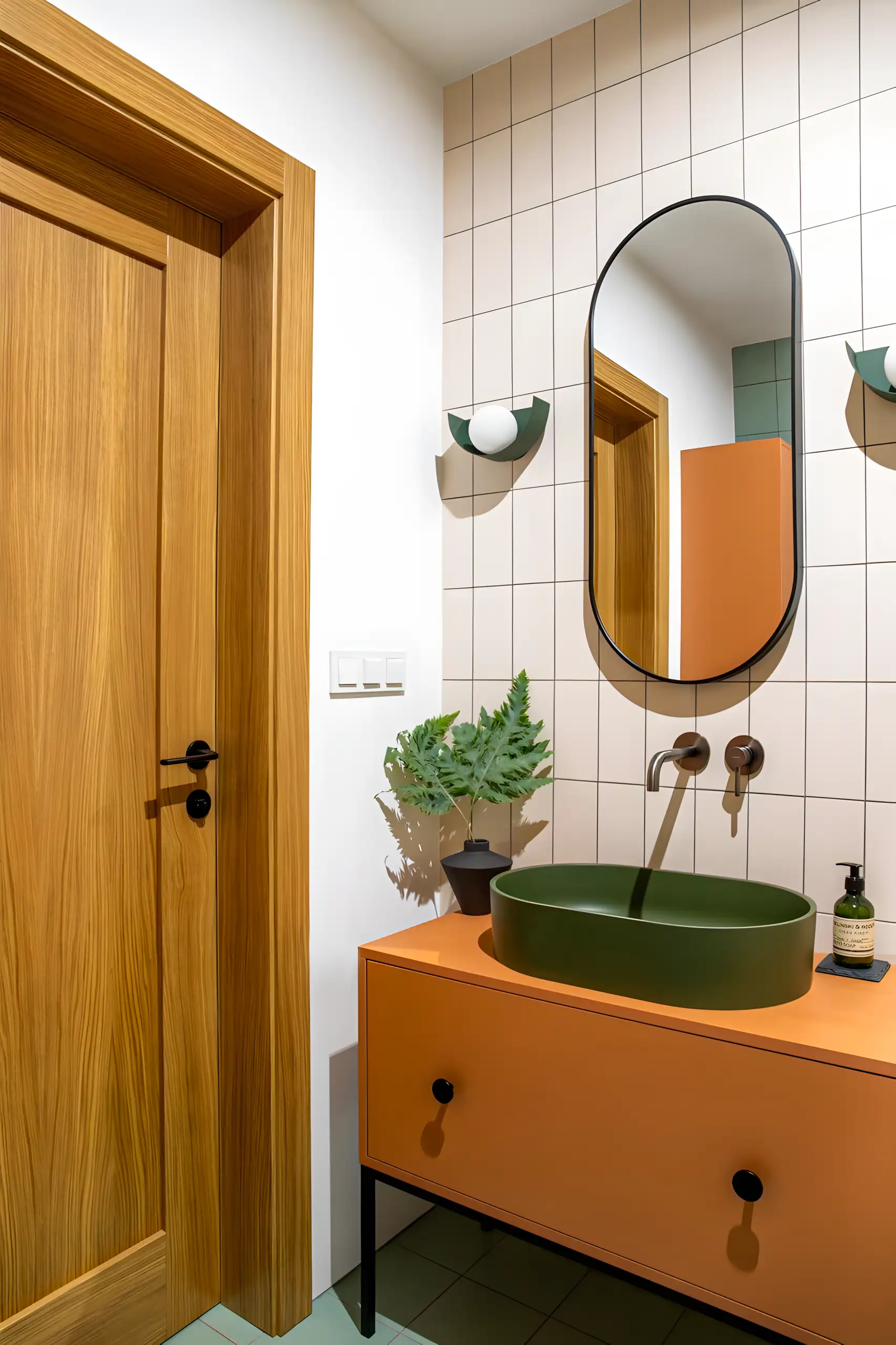 Bold and Modern Bathroom with Green Basin and Orange Vanity | Material Depot