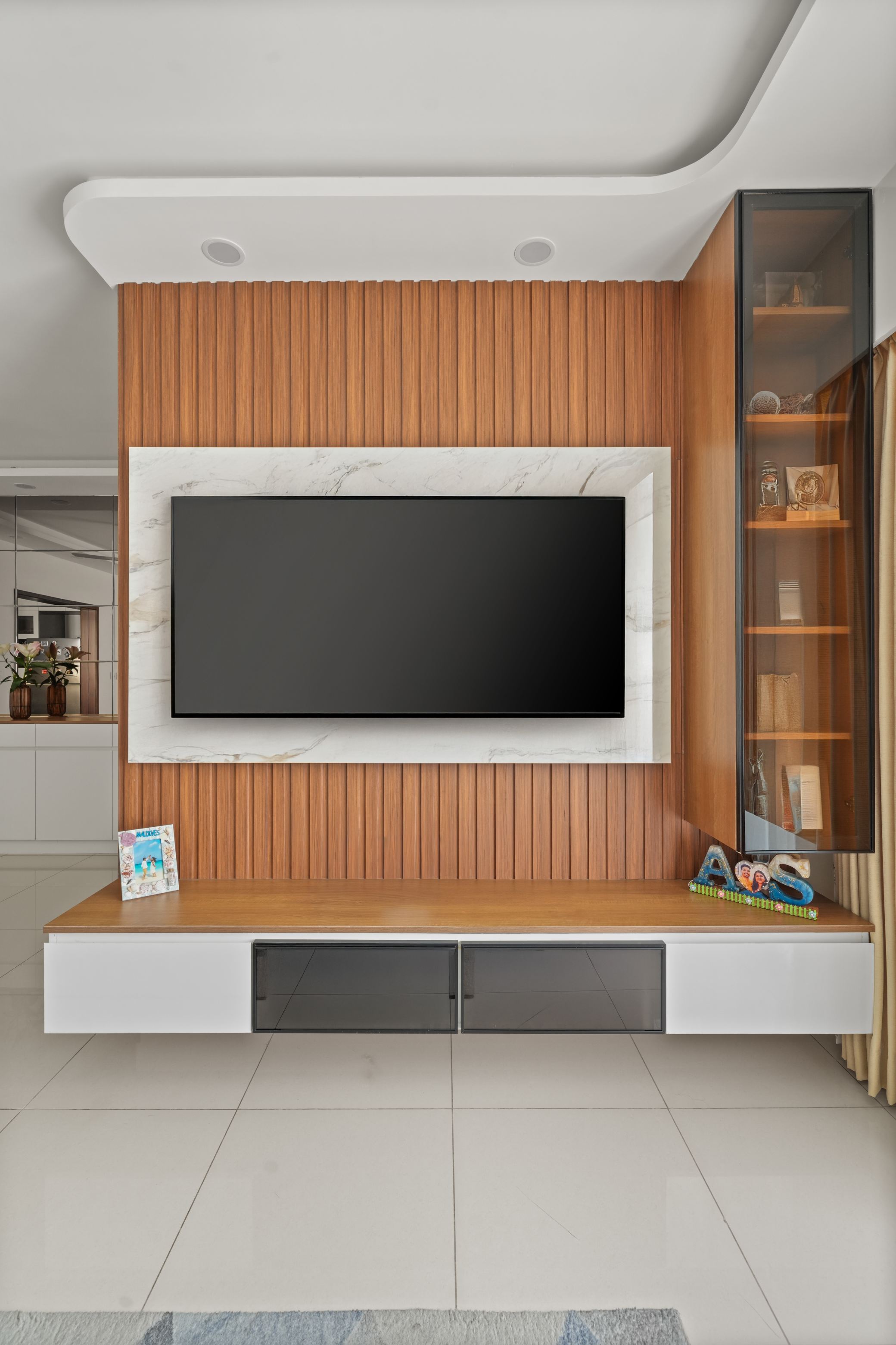 modern-tv-unit-with-marblelook-laminate-frame-fluted-wood-laminate ...